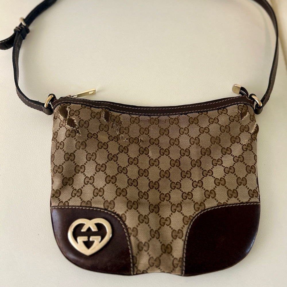 GUCCI GG Canvas Medium lovely hobo bag